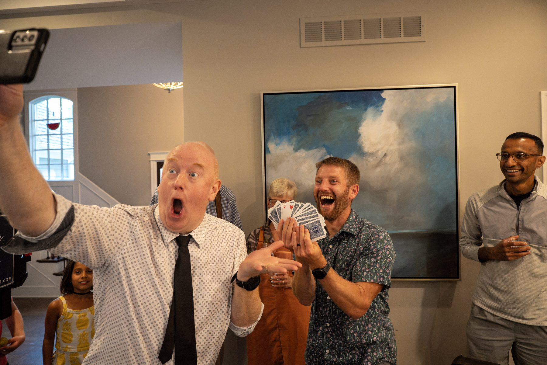 Reaction selfie with a signed card.